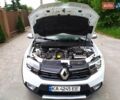 Белый Рено Сандеро СтэпВэй, объемом двигателя 1.46 л и пробегом 135 тыс. км за 12350 $, фото 36 на Automoto.ua