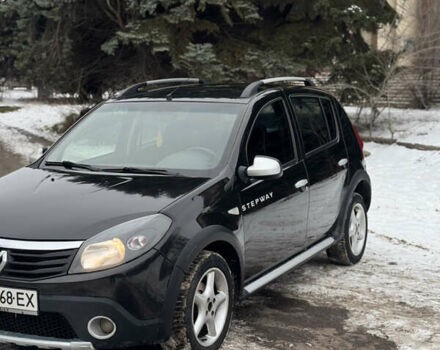Черный Рено Сандеро СтэпВэй, объемом двигателя 1.6 л и пробегом 195 тыс. км за 5800 $, фото 1 на Automoto.ua