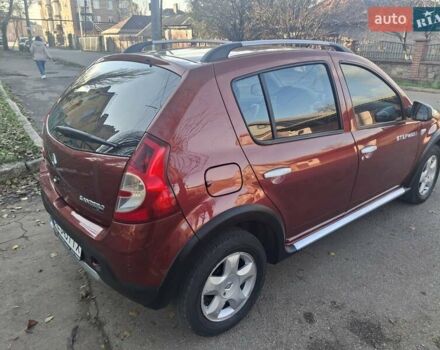 Красный Рено Сандеро СтэпВэй, объемом двигателя 1.6 л и пробегом 160 тыс. км за 6450 $, фото 7 на Automoto.ua