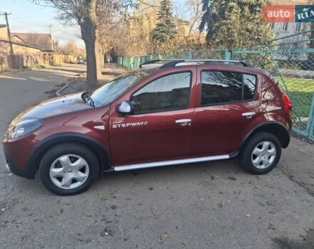 Красный Рено Сандеро СтэпВэй, объемом двигателя 1.6 л и пробегом 160 тыс. км за 6450 $, фото 1 на Automoto.ua