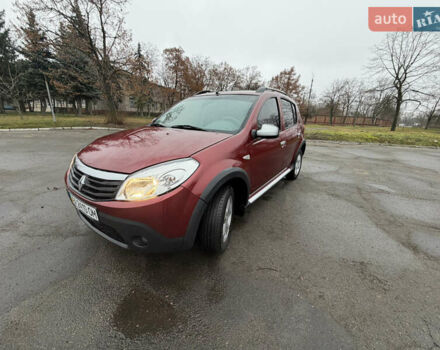 Красный Рено Сандеро СтэпВэй, объемом двигателя 1.6 л и пробегом 91 тыс. км за 5700 $, фото 1 на Automoto.ua