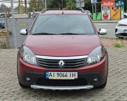 Красный Рено Сандеро СтэпВэй, объемом двигателя 1.6 л и пробегом 75 тыс. км за 7500 $, фото 1 на Automoto.ua