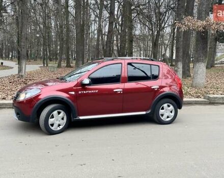 Красный Рено Сандеро СтэпВэй, объемом двигателя 1.6 л и пробегом 204 тыс. км за 5950 $, фото 1 на Automoto.ua