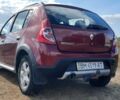 Красный Рено Сандеро СтэпВэй, объемом двигателя 1.6 л и пробегом 228 тыс. км за 6200 $, фото 1 на Automoto.ua