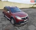 Красный Рено Сандеро СтэпВэй, объемом двигателя 1.6 л и пробегом 266 тыс. км за 6500 $, фото 1 на Automoto.ua
