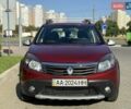 Червоний Рено Сандеро СтепВей, об'ємом двигуна 1.6 л та пробігом 114 тис. км за 7800 $, фото 15 на Automoto.ua