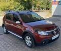Красный Рено Сандеро СтэпВэй, объемом двигателя 1.6 л и пробегом 180 тыс. км за 6999 $, фото 7 на Automoto.ua