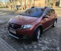Красный Рено Сандеро СтэпВэй, объемом двигателя 1.5 л и пробегом 143 тыс. км за 8100 $, фото 3 на Automoto.ua