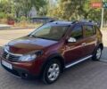 Красный Рено Сандеро СтэпВэй, объемом двигателя 1.6 л и пробегом 180 тыс. км за 6999 $, фото 1 на Automoto.ua