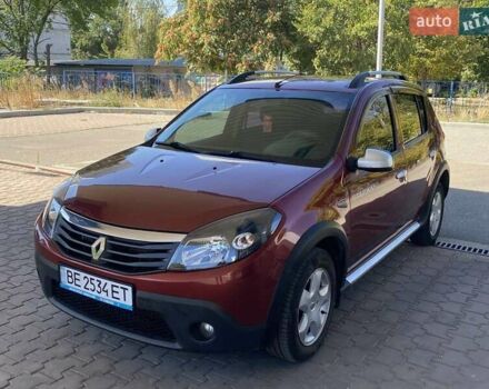Красный Рено Сандеро СтэпВэй, объемом двигателя 1.6 л и пробегом 180 тыс. км за 6999 $, фото 1 на Automoto.ua