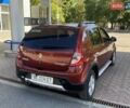 Красный Рено Сандеро СтэпВэй, объемом двигателя 1.6 л и пробегом 180 тыс. км за 6999 $, фото 11 на Automoto.ua