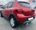 Красный Рено Сандеро СтэпВэй, объемом двигателя 1.5 л и пробегом 125 тыс. км за 7900 $, фото 3 на Automoto.ua