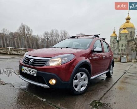 Красный Рено Сандеро СтэпВэй, объемом двигателя 1.6 л и пробегом 102 тыс. км за 6600 $, фото 1 на Automoto.ua