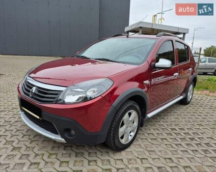 Червоний Рено Сандеро СтепВей, об'ємом двигуна 1.6 л та пробігом 77 тис. км за 7500 $, фото 1 на Automoto.ua
