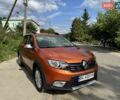 Оранжевый Рено Сандеро СтэпВэй, объемом двигателя 1.46 л и пробегом 63 тыс. км за 13000 $, фото 1 на Automoto.ua
