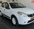 Белый Рено Сандеро, объемом двигателя 1.4 л и пробегом 150 тыс. км за 5550 $, фото 1 на Automoto.ua