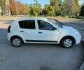 Белый Рено Сандеро, объемом двигателя 1.39 л и пробегом 210 тыс. км за 5500 $, фото 1 на Automoto.ua