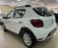 Белый Рено Сандеро, объемом двигателя 0.9 л и пробегом 63 тыс. км за 8600 $, фото 1 на Automoto.ua