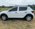 Білий Рено Сандеро, об'ємом двигуна 1.5 л та пробігом 297 тис. км за 7885 $, фото 4 на Automoto.ua