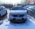 Белый Рено Сандеро, объемом двигателя 1.46 л и пробегом 383 тыс. км за 4000 $, фото 1 на Automoto.ua