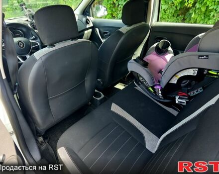 Белый Рено Сандеро, объемом двигателя 1 л и пробегом 57 тыс. км за 9500 $, фото 3 на Automoto.ua