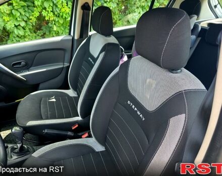 Белый Рено Сандеро, объемом двигателя 1 л и пробегом 57 тыс. км за 9500 $, фото 4 на Automoto.ua