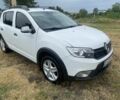 Білий Рено Сандеро, об'ємом двигуна 1.5 л та пробігом 297 тис. км за 7885 $, фото 1 на Automoto.ua