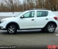 Белый Рено Сандеро, объемом двигателя 0.9 л и пробегом 144 тыс. км за 9900 $, фото 2 на Automoto.ua