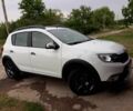 Белый Рено Сандеро, объемом двигателя 1.5 л и пробегом 65 тыс. км за 12900 $, фото 1 на Automoto.ua