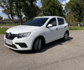 Білий Рено Сандеро, об'ємом двигуна 1 л та пробігом 148 тис. км за 6100 $, фото 1 на Automoto.ua