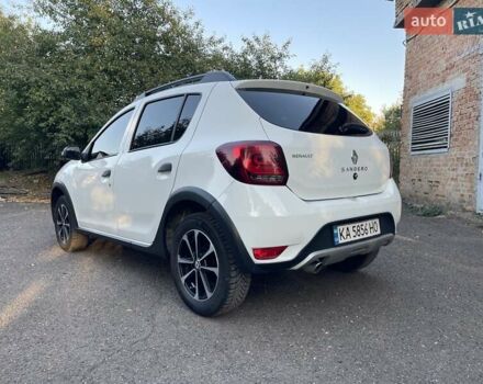 Білий Рено Сандеро, об'ємом двигуна 1.46 л та пробігом 130 тис. км за 8999 $, фото 6 на Automoto.ua