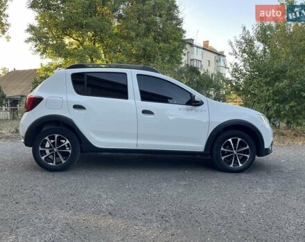 Білий Рено Сандеро, об'ємом двигуна 1.46 л та пробігом 130 тис. км за 8999 $, фото 9 на Automoto.ua