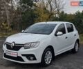 Білий Рено Сандеро, об'ємом двигуна 1 л та пробігом 70 тис. км за 7499 $, фото 1 на Automoto.ua