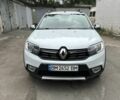 Белый Рено Сандеро, объемом двигателя 0.9 л и пробегом 276 тыс. км за 7500 $, фото 1 на Automoto.ua