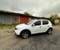 Белый Рено Сандеро, объемом двигателя 0.9 л и пробегом 57 тыс. км за 9500 $, фото 1 на Automoto.ua