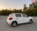 Белый Рено Сандеро, объемом двигателя 0.9 л и пробегом 57 тыс. км за 8490 $, фото 2 на Automoto.ua
