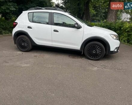 Белый Рено Сандеро, объемом двигателя 0.9 л и пробегом 68 тыс. км за 12490 $, фото 1 на Automoto.ua