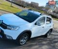 Білий Рено Сандеро, об'ємом двигуна 1.46 л та пробігом 65 тис. км за 12700 $, фото 1 на Automoto.ua