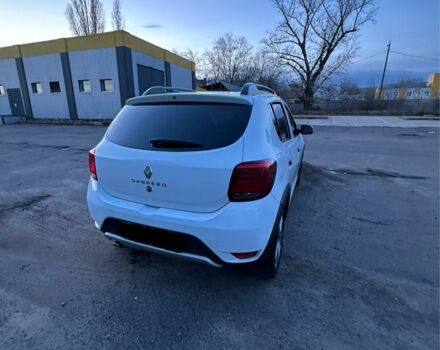 Белый Рено Сандеро, объемом двигателя 1.5 л и пробегом 58 тыс. км за 10999 $, фото 6 на Automoto.ua