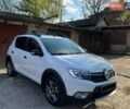 Белый Рено Сандеро, объемом двигателя 1.46 л и пробегом 58 тыс. км за 11800 $, фото 1 на Automoto.ua