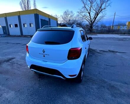 Белый Рено Сандеро, объемом двигателя 1.5 л и пробегом 58 тыс. км за 10999 $, фото 6 на Automoto.ua