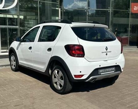 Белый Рено Сандеро, объемом двигателя 0.9 л и пробегом 67 тыс. км за 11464 $, фото 1 на Automoto.ua