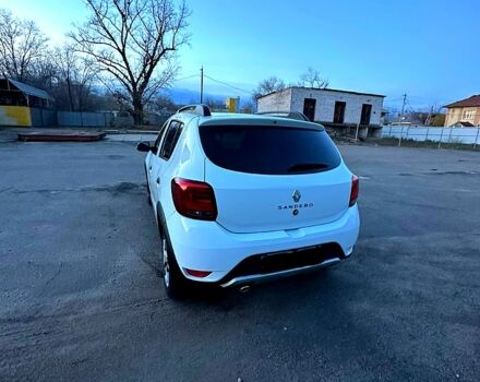 Белый Рено Сандеро, объемом двигателя 1.5 л и пробегом 58 тыс. км за 10999 $, фото 7 на Automoto.ua