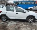 Белый Рено Сандеро, объемом двигателя 1.46 л и пробегом 100 тыс. км за 10500 $, фото 2 на Automoto.ua