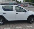 Белый Рено Сандеро, объемом двигателя 0.9 л и пробегом 99 тыс. км за 11300 $, фото 1 на Automoto.ua