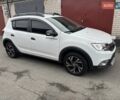 Белый Рено Сандеро, объемом двигателя 0.9 л и пробегом 55 тыс. км за 11800 $, фото 1 на Automoto.ua
