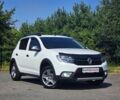 Білий Рено Сандеро, об'ємом двигуна 1.5 л та пробігом 80 тис. км за 11502 $, фото 1 на Automoto.ua