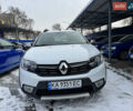 Белый Рено Сандеро, объемом двигателя 1.46 л и пробегом 89 тыс. км за 12048 $, фото 1 на Automoto.ua
