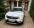 Белый Рено Сандеро, объемом двигателя 0.9 л и пробегом 82 тыс. км за 12000 $, фото 1 на Automoto.ua