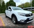 Белый Рено Сандеро, объемом двигателя 1.5 л и пробегом 87 тыс. км за 11650 $, фото 1 на Automoto.ua